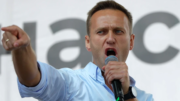 Emerging from imprisonment, Russian opposition leader Alexei Navalny resurfaces with wryly humorous remarks after being transferred to an Arctic prison colony.